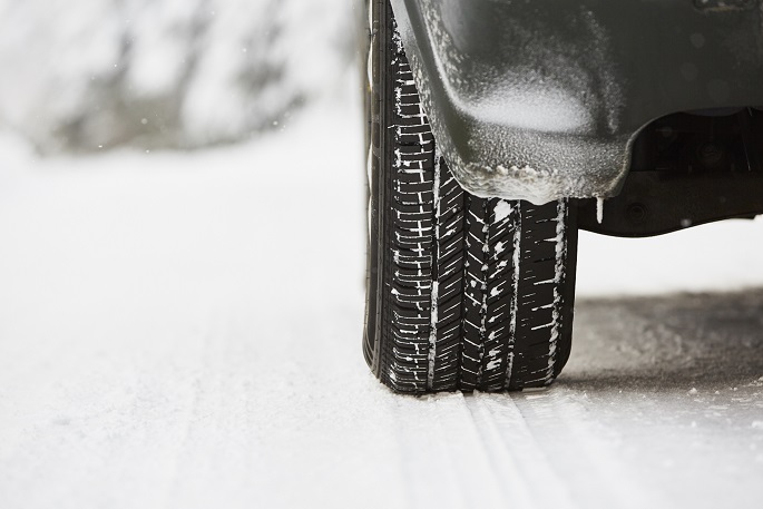 Winter tyre on snowy road